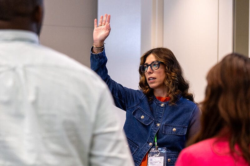 Cara-Lyn Giovanniello engaging with the audience at the 2025 Community Wealth Council